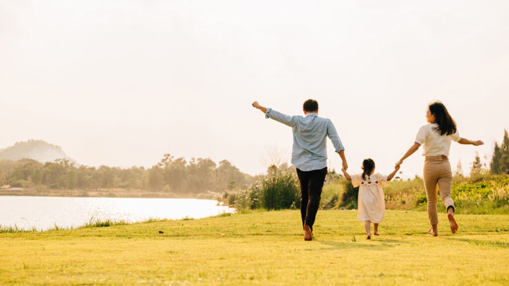 who is UFF United Financial Freedom - happy family, river side, lake, husband and wife with little daughter